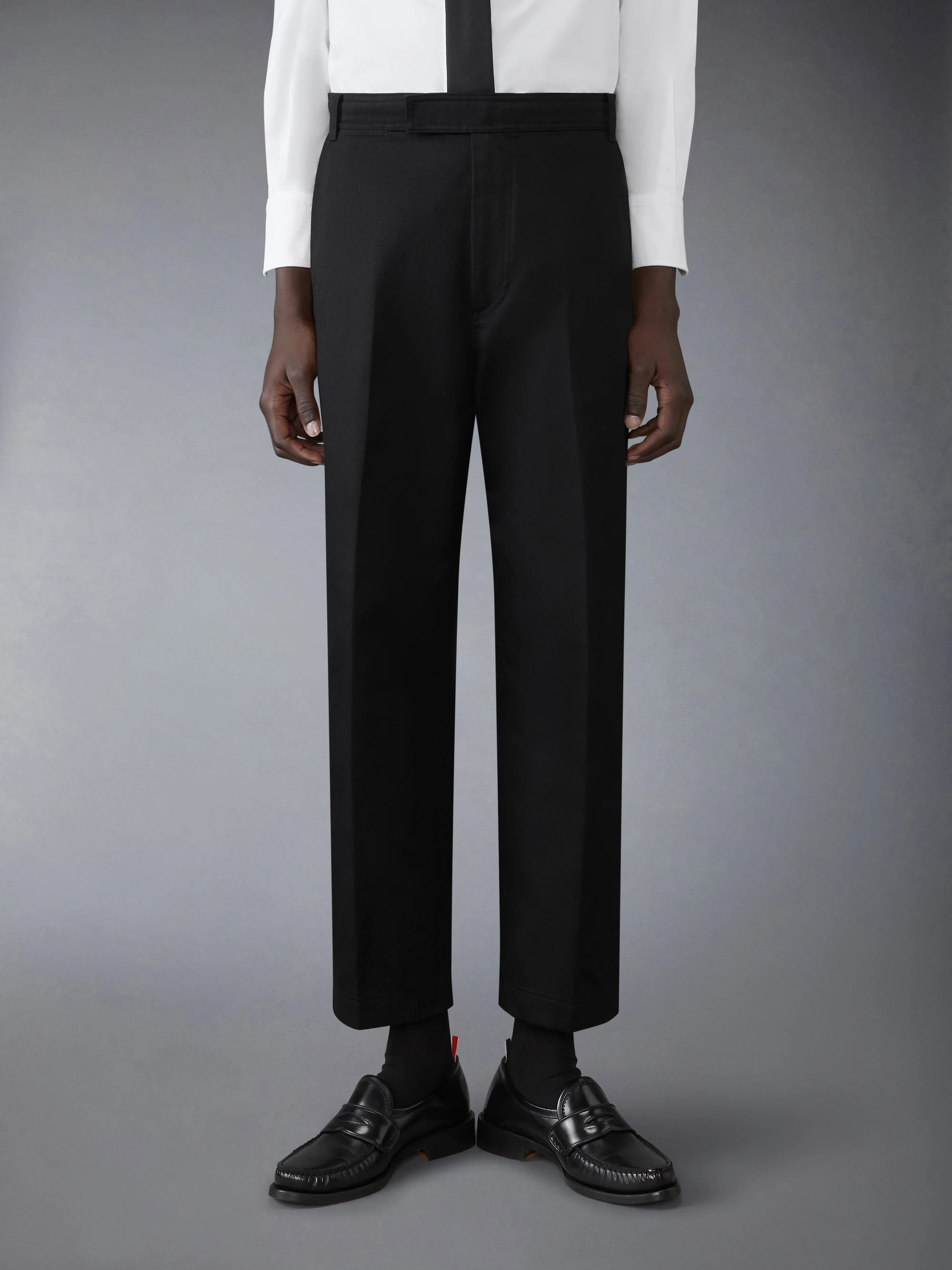 COTTON TWILL UTILITY TROUSERS sold by Thom Browne