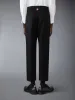 COTTON TWILL UTILITY TROUSERS sold by Thom Browne