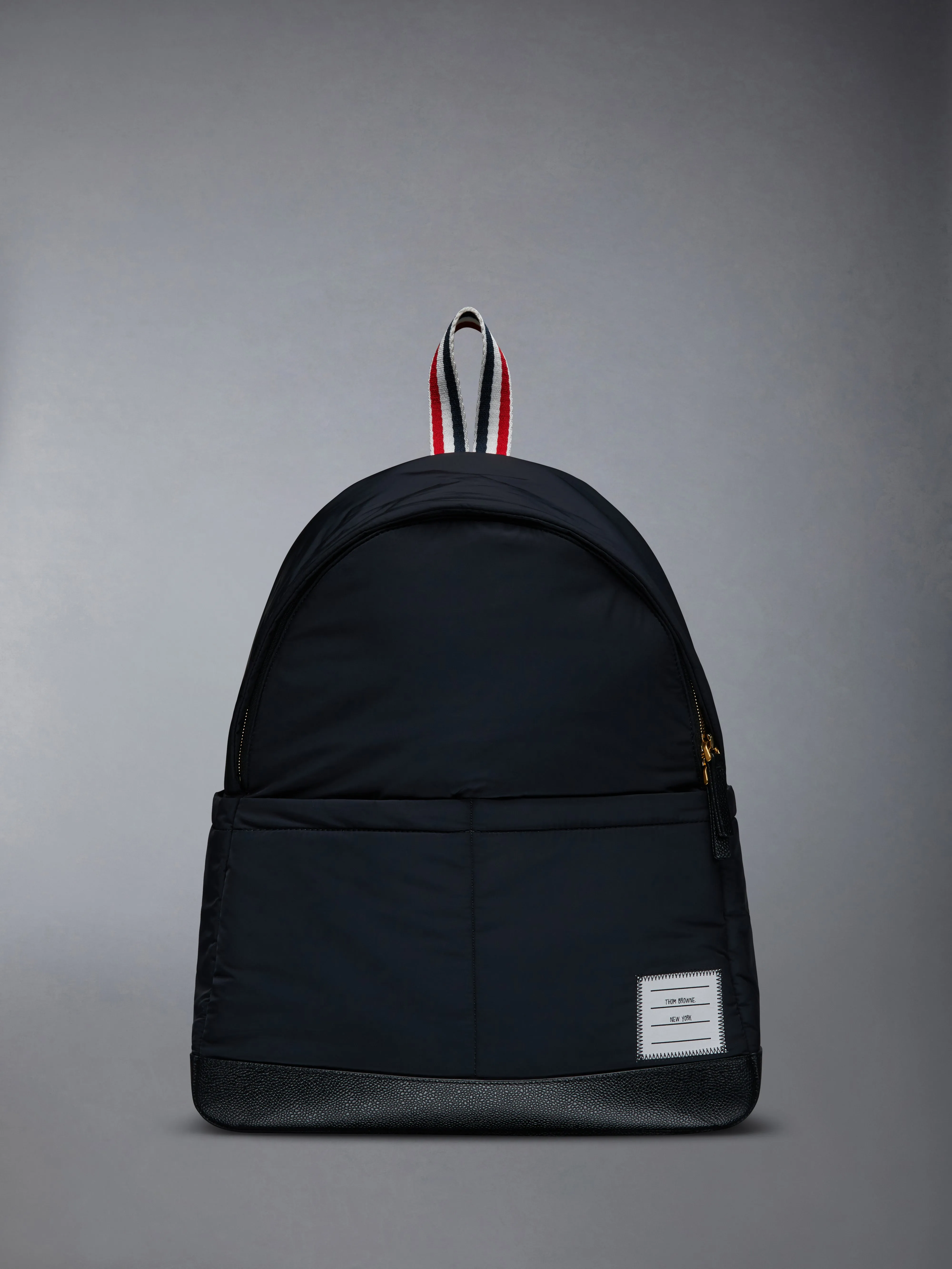POLY TWILL MULTIPOCKET BACKPACK sold by Thom Browne