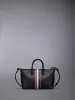 PEBBLE GRAIN SMALL DUFFLE BAG sold by Thom Browne