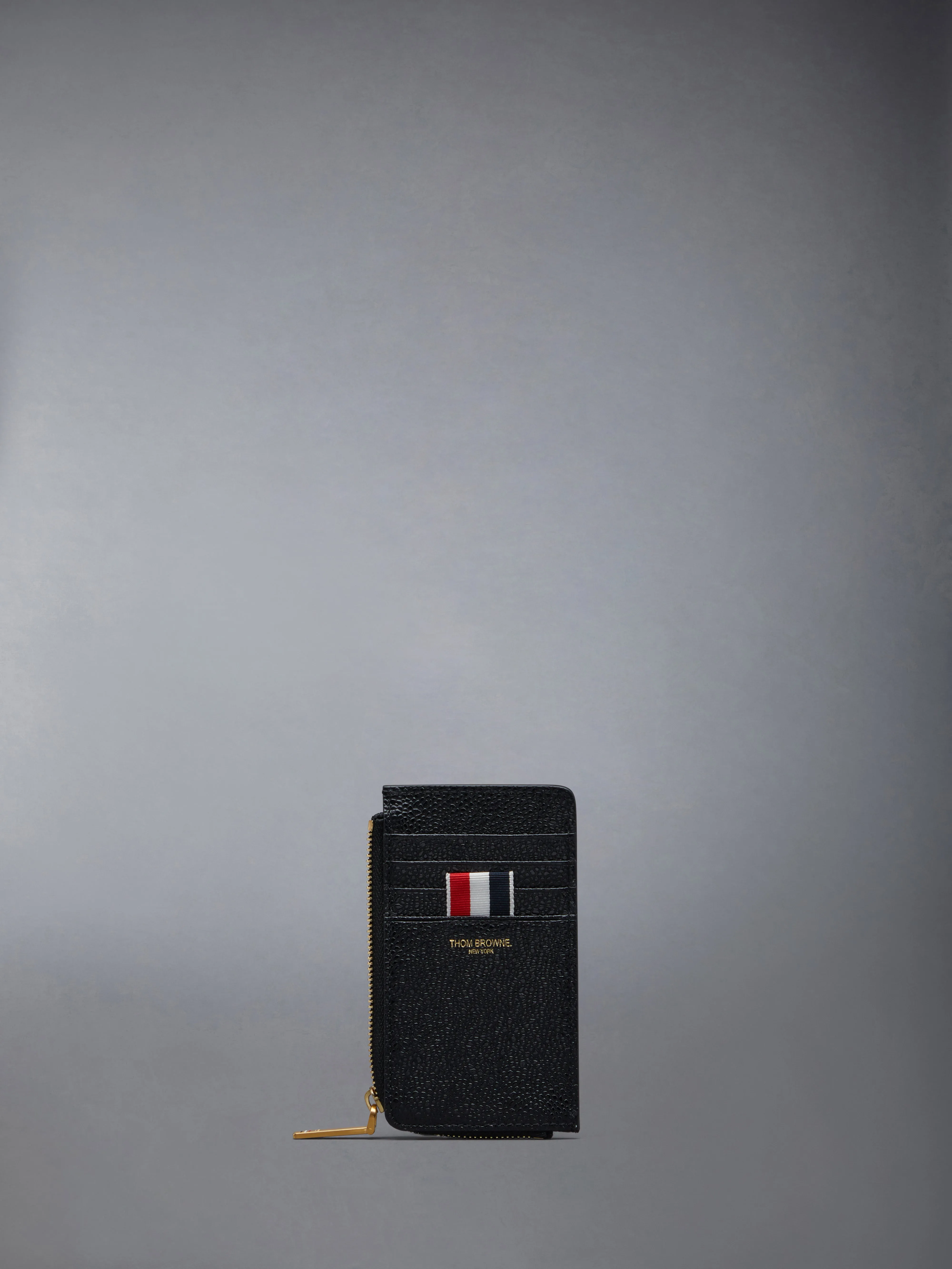 Pebble Grain Leather Half Zip Wallet sold by Thom Browne