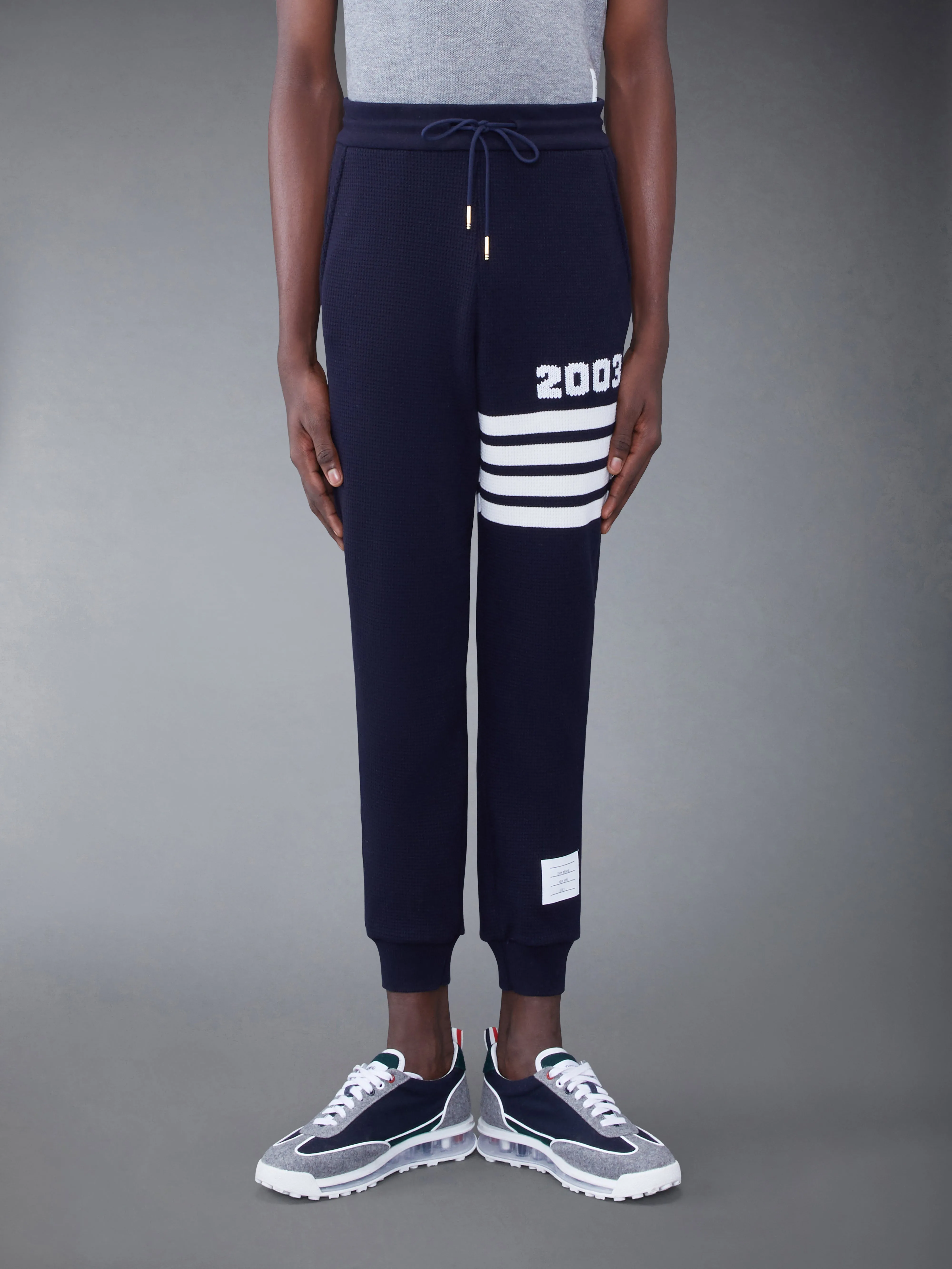 CASHMERE WAFFLE 2003 4-BAR SWEATPANTS sold by Thom Browne