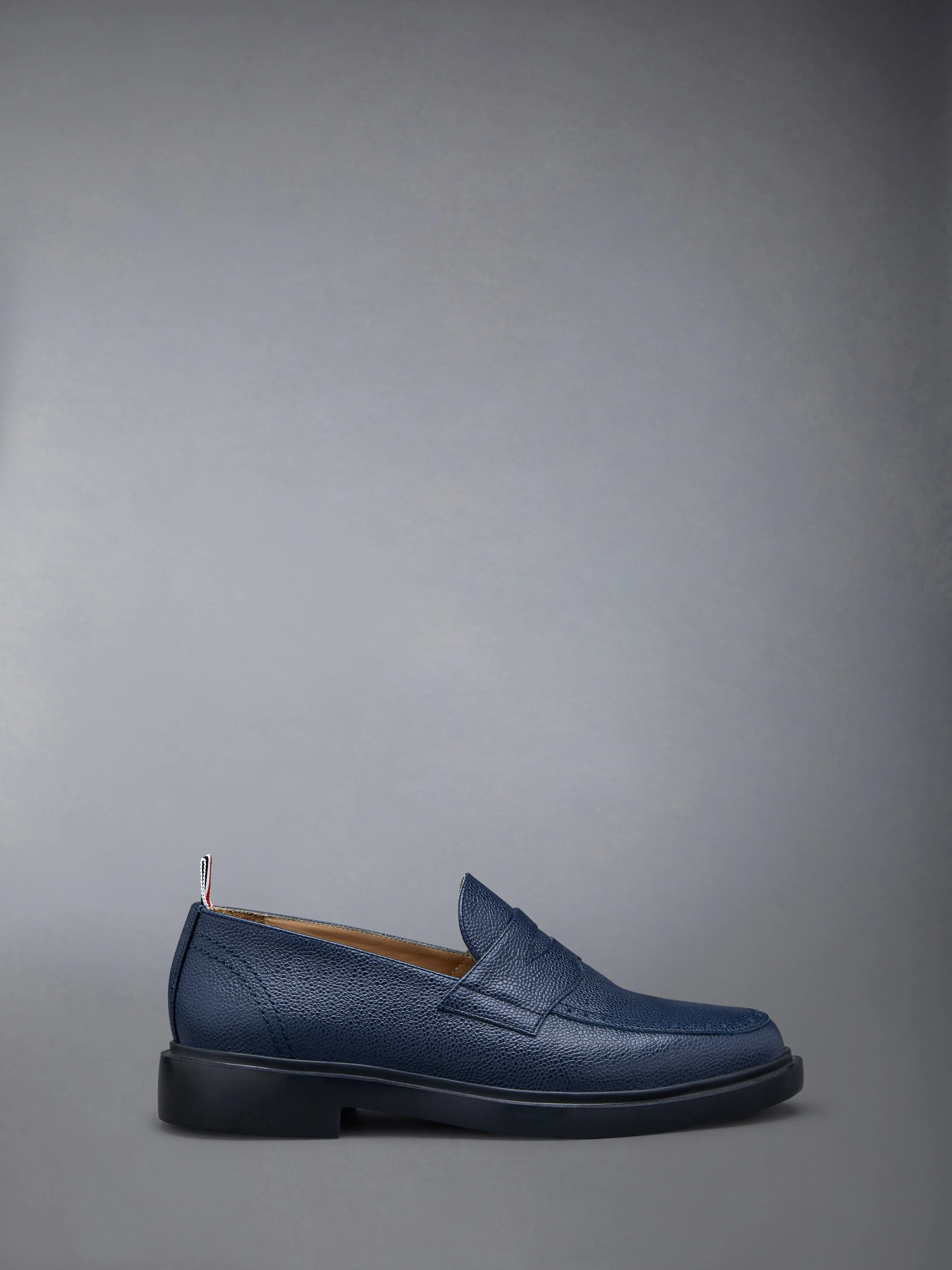 Pebble Grain Leather Rubber Sole Penny Loafer sold by Thom Browne