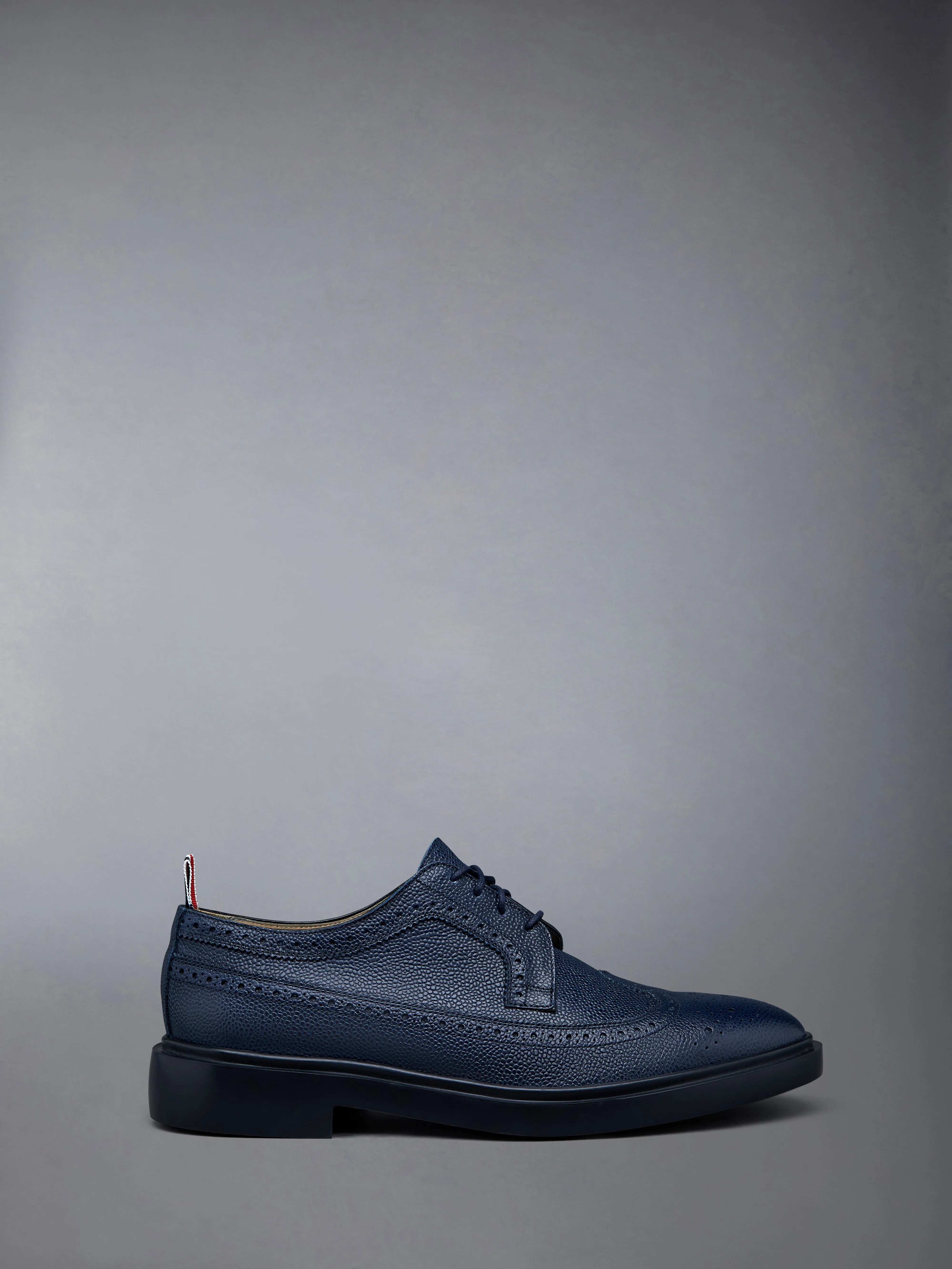 Pebble Grain Leather Longwing Brogue sold by Thom Browne