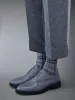 Pebble Grain Leather Longwing Brogue sold by Thom Browne