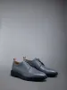 Pebble Grain Leather Longwing Brogue sold by Thom Browne
