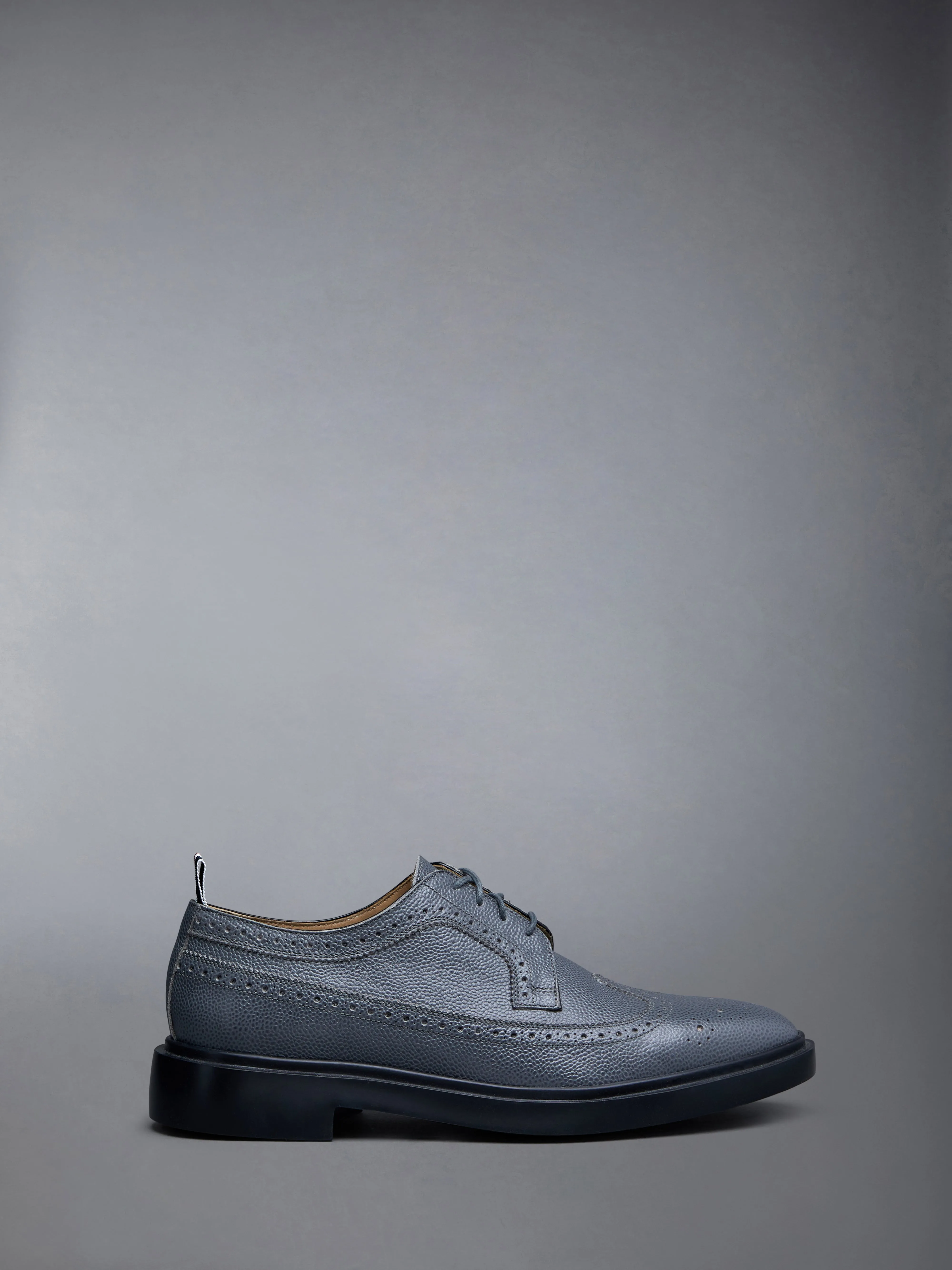 Pebble Grain Leather Longwing Brogue sold by Thom Browne