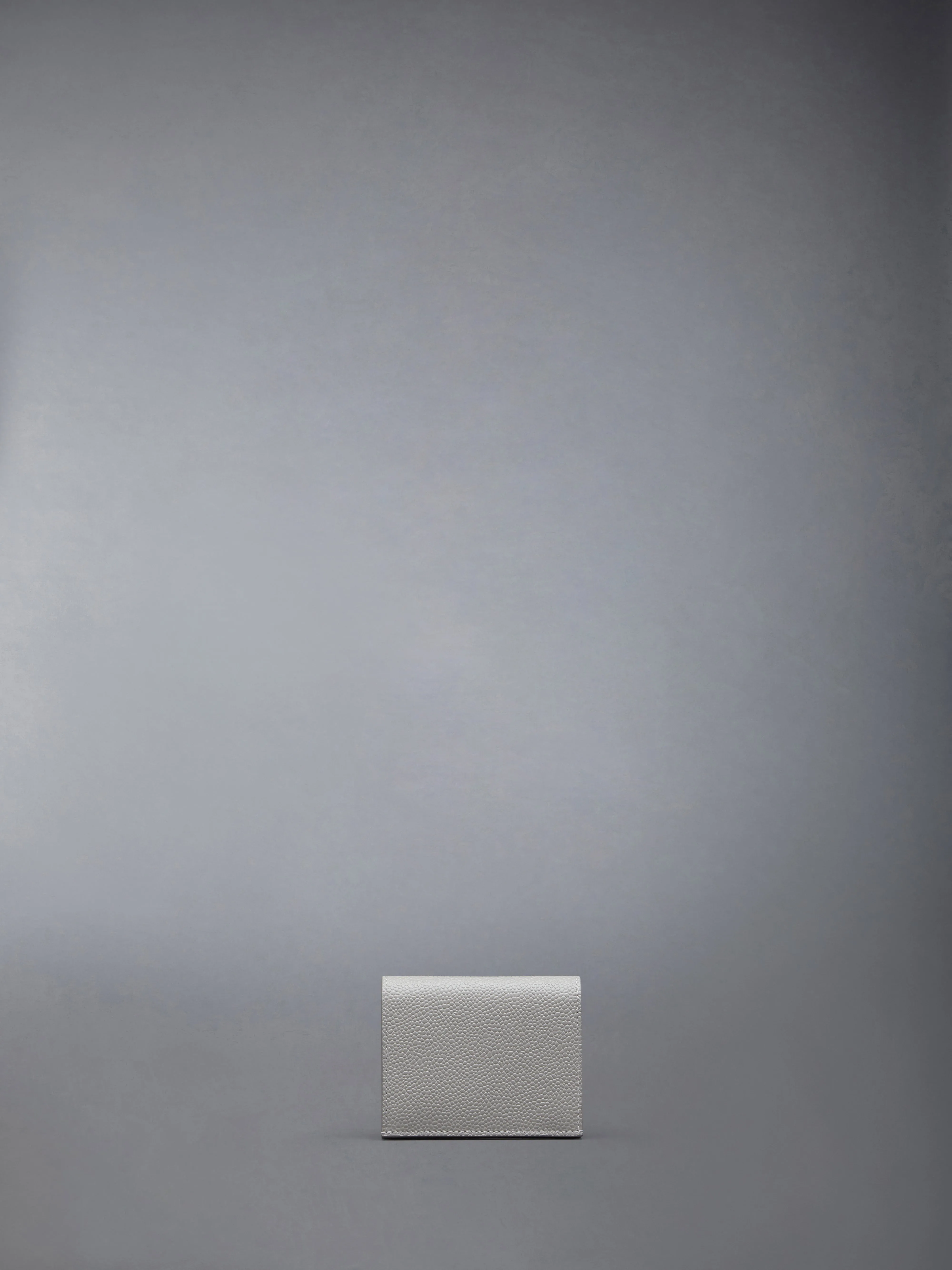 PEBBLE GRAIN LEATHER DOUBLE CARD HOLDER sold by Thom Browne