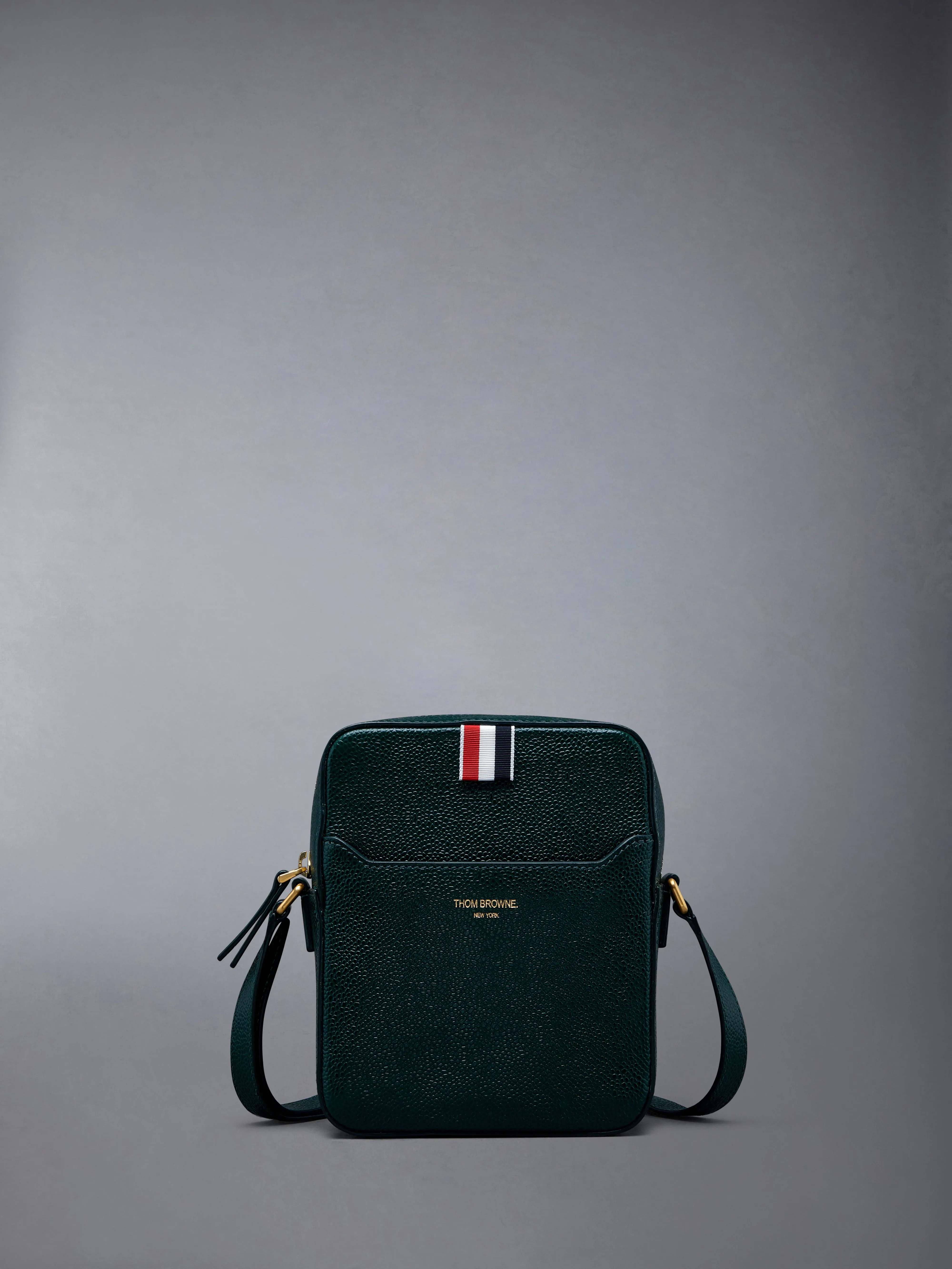 PEBBLE GRAIN LEATHER VERTICAL CAMERA BAG sold by Thom Browne
