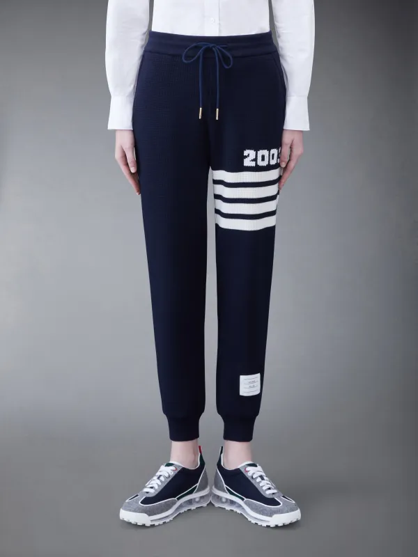 CASHMERE WAFFLE 2003 4-BAR SWEATPANTS sold by Thom Browne