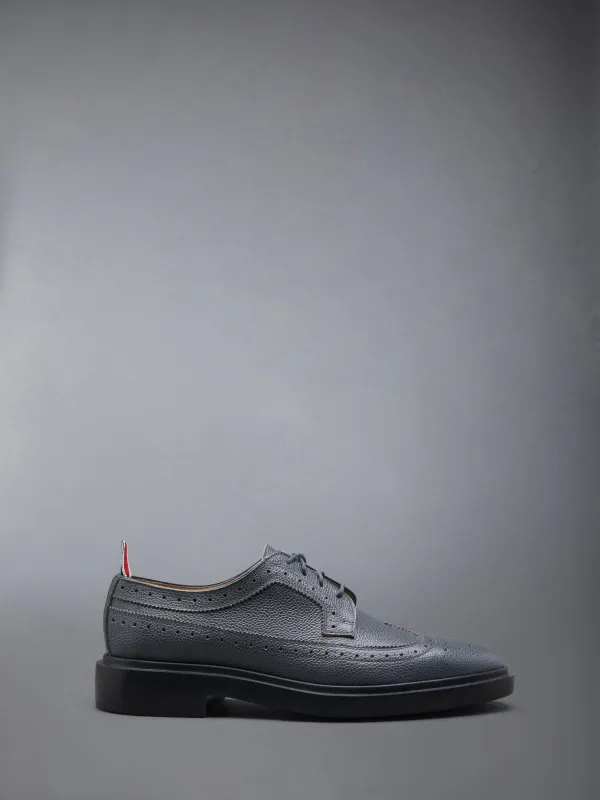 Pebble Grain Leather Longwing Brogue sold by Thom Browne