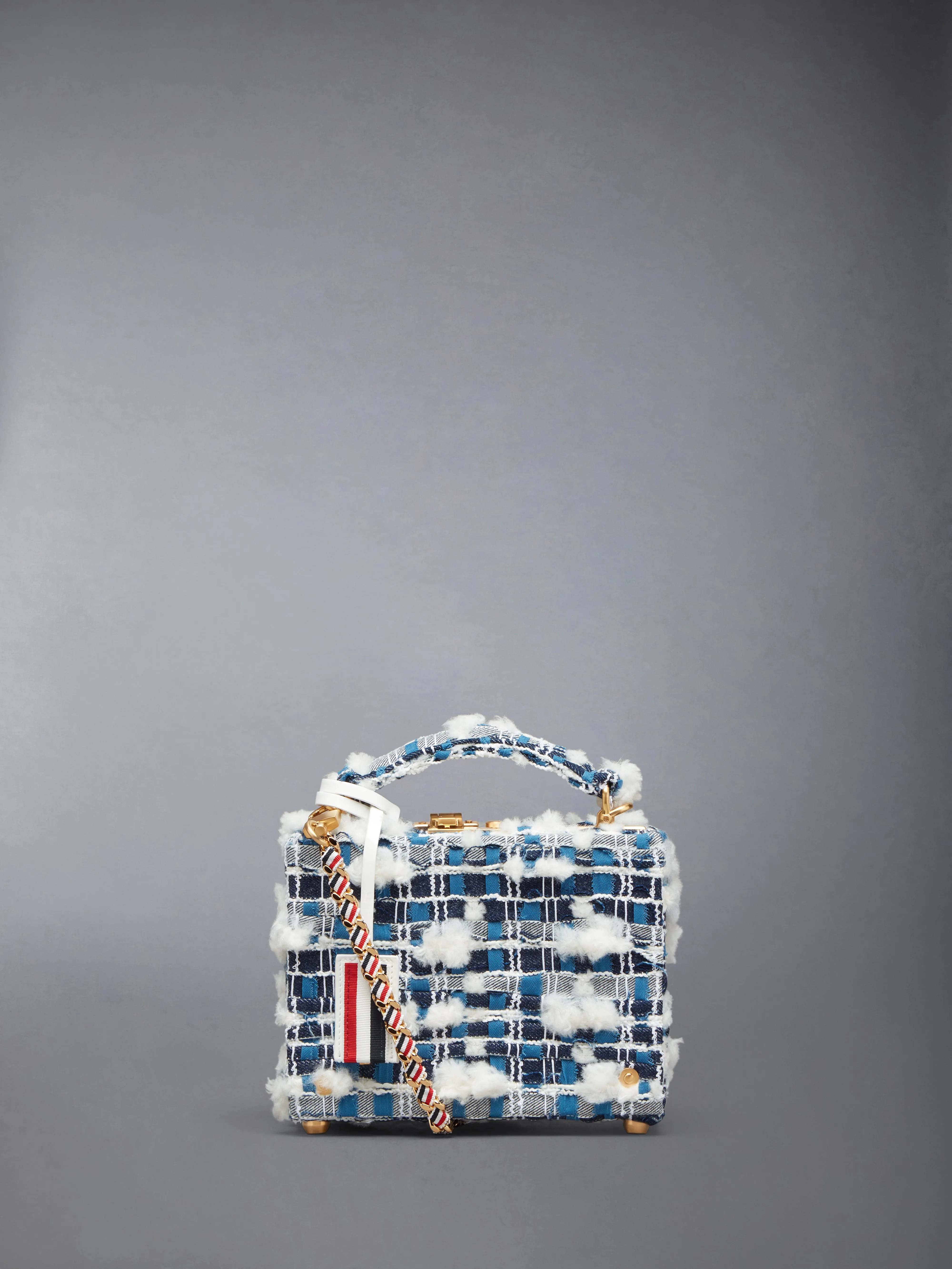 MICRO ATTACHE CASE W/ RWB GG WOVEN CHAIN IN DENIM POUF TWEED sold by Thom Browne