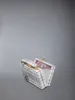 Tartan Tweed Woven Chain Micro Attache Case sold by Thom Browne