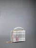 Tartan Tweed Woven Chain Micro Attache Case sold by Thom Browne