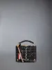 Plaid Ribbon Tweed Woven Chain Micro Attache Case sold by Thom Browne