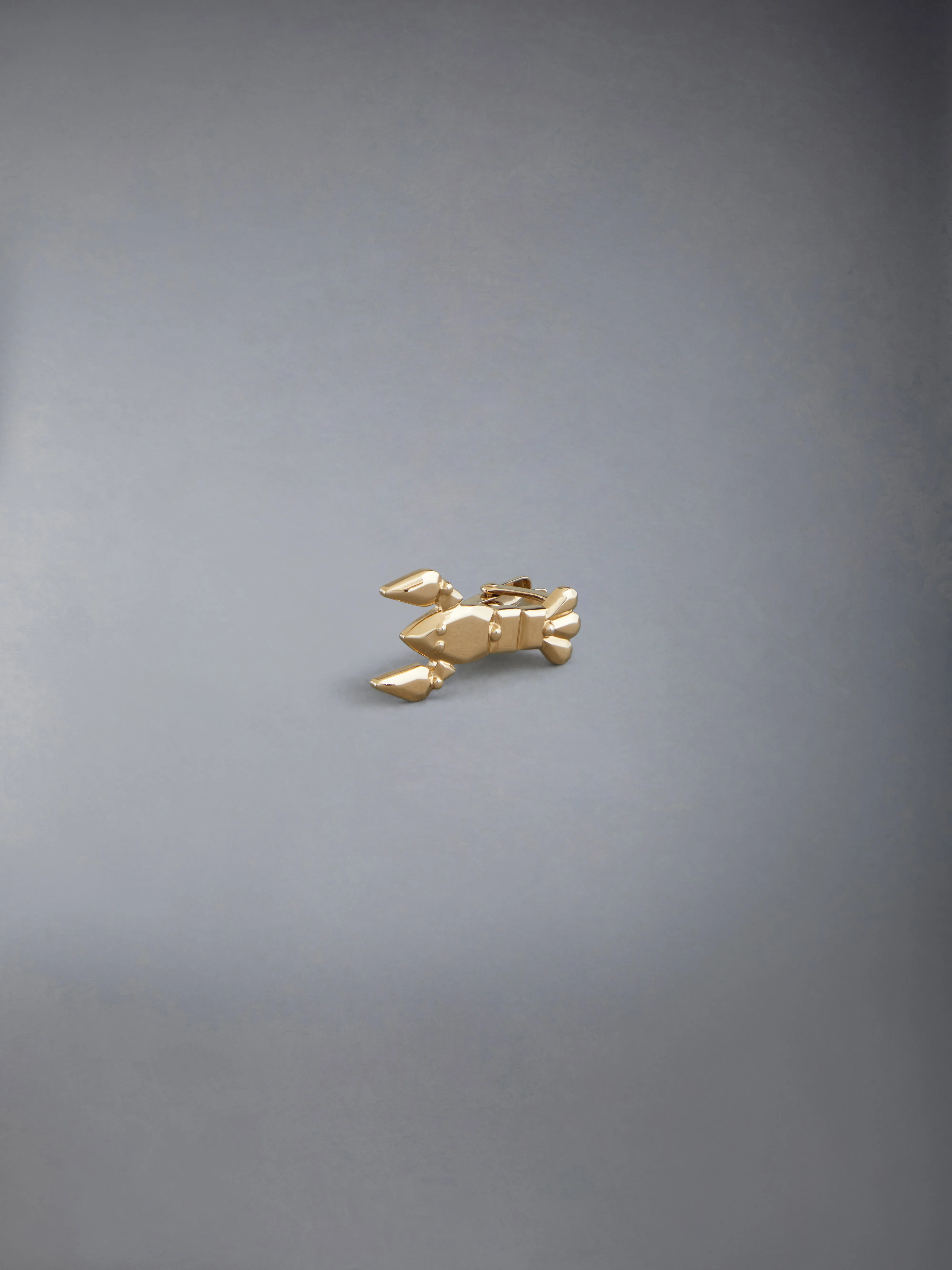 BRASS LOBSTER TIE BAR sold by Thom Browne