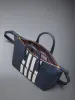PEBBLE GRAIN 4-BAR SMALL DUFFLE sold by Thom Browne