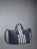 PEBBLE GRAIN 4-BAR SMALL DUFFLE sold by Thom Browne