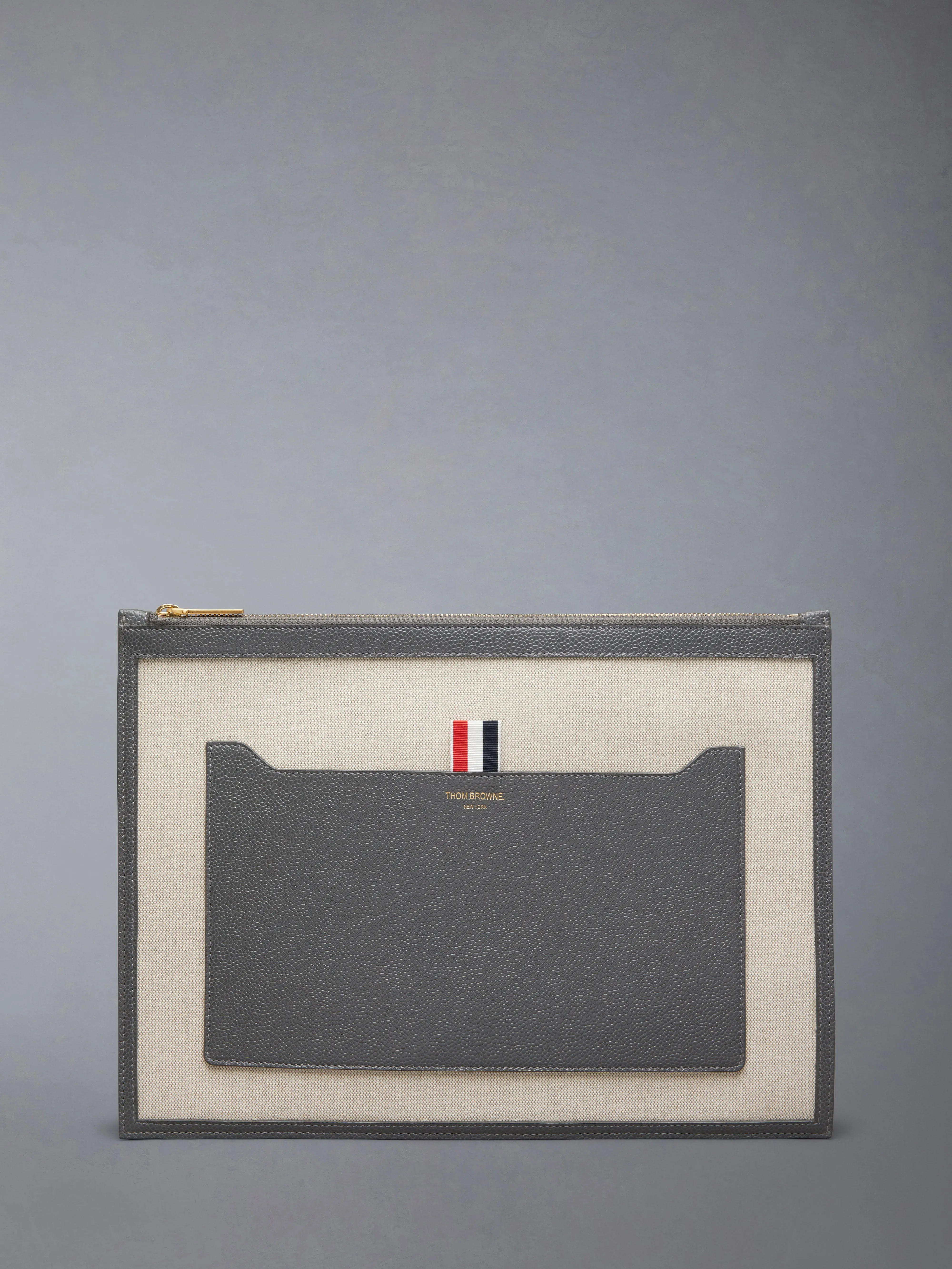 COTTON CANVAS MEDIUM POUCH sold by Thom Browne
