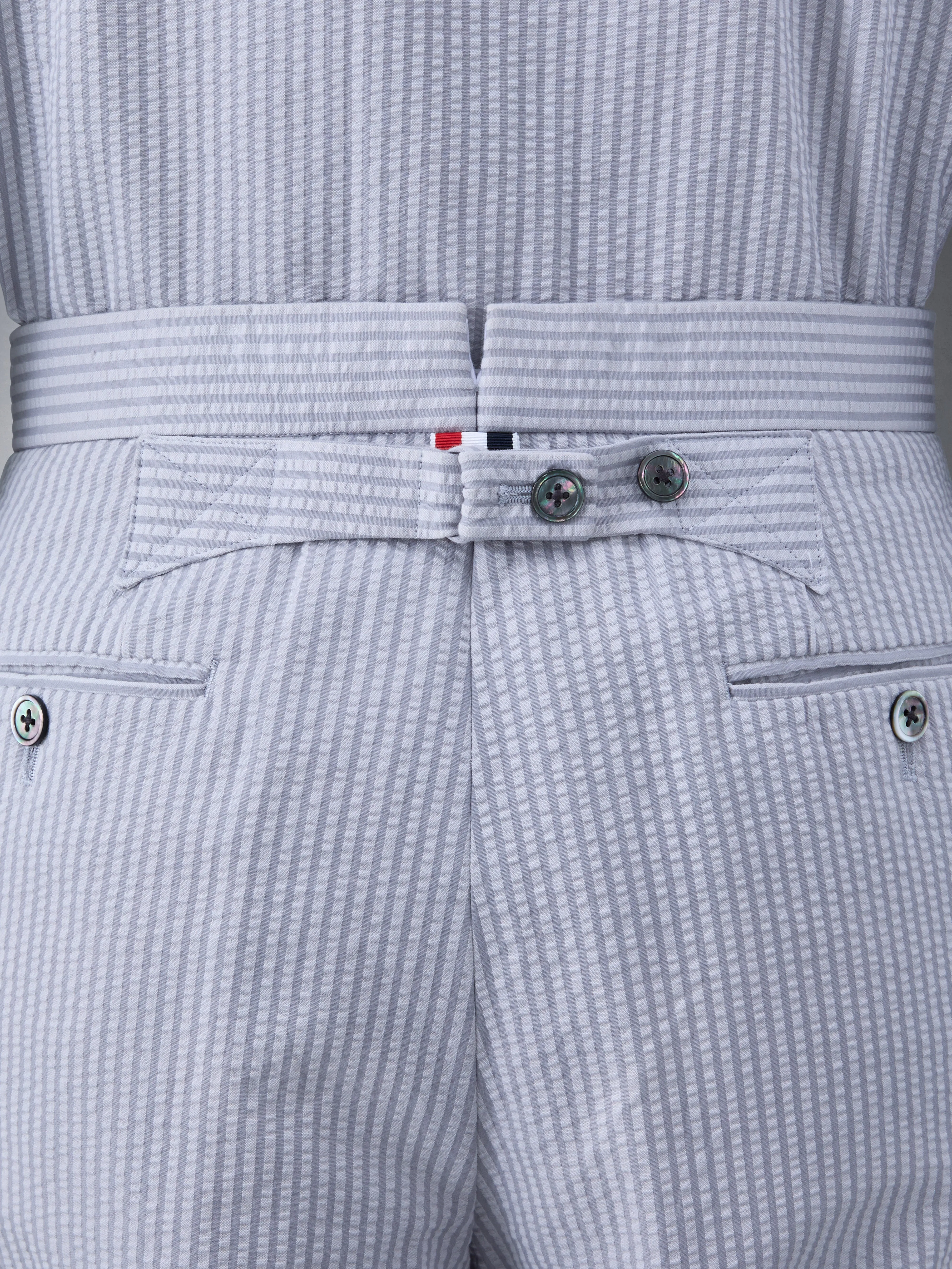 SEERSUCKER LOW RISE BACKSTRAP TROUSER sold by Thom Browne product image thumbnail 4