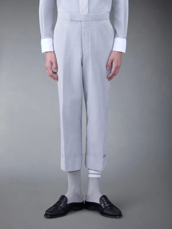 SEERSUCKER LOW RISE BACKSTRAP TROUSER sold by Thom Browne