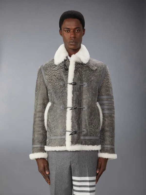 SHEARLING CROPPED DUFFLE COAT sold by Thom Browne