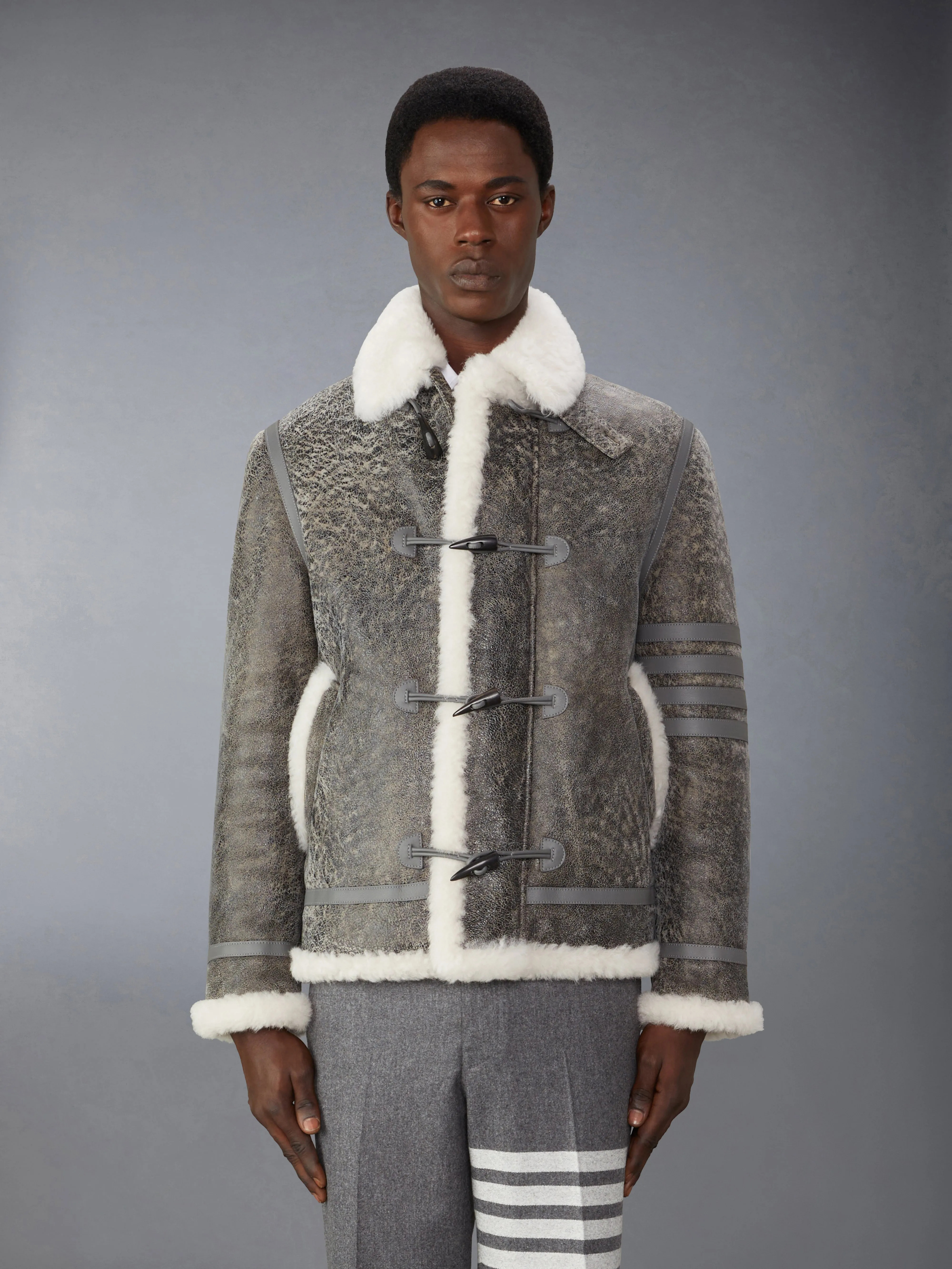 SHEARLING CROPPED DUFFLE COAT sold by Thom Browne