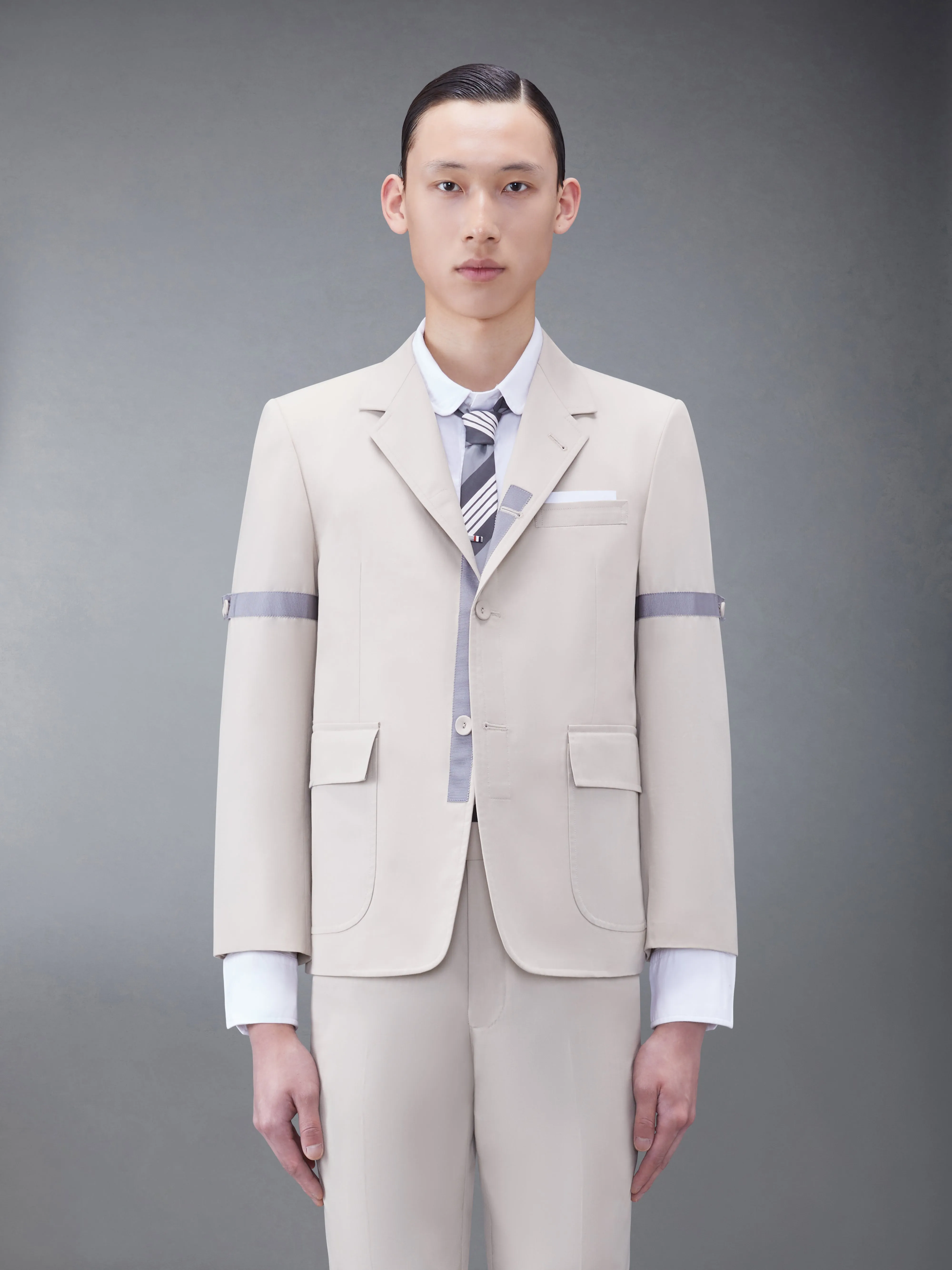 TYPEWRITER CLOTH ARMBAND SPORT COAT sold by Thom Browne