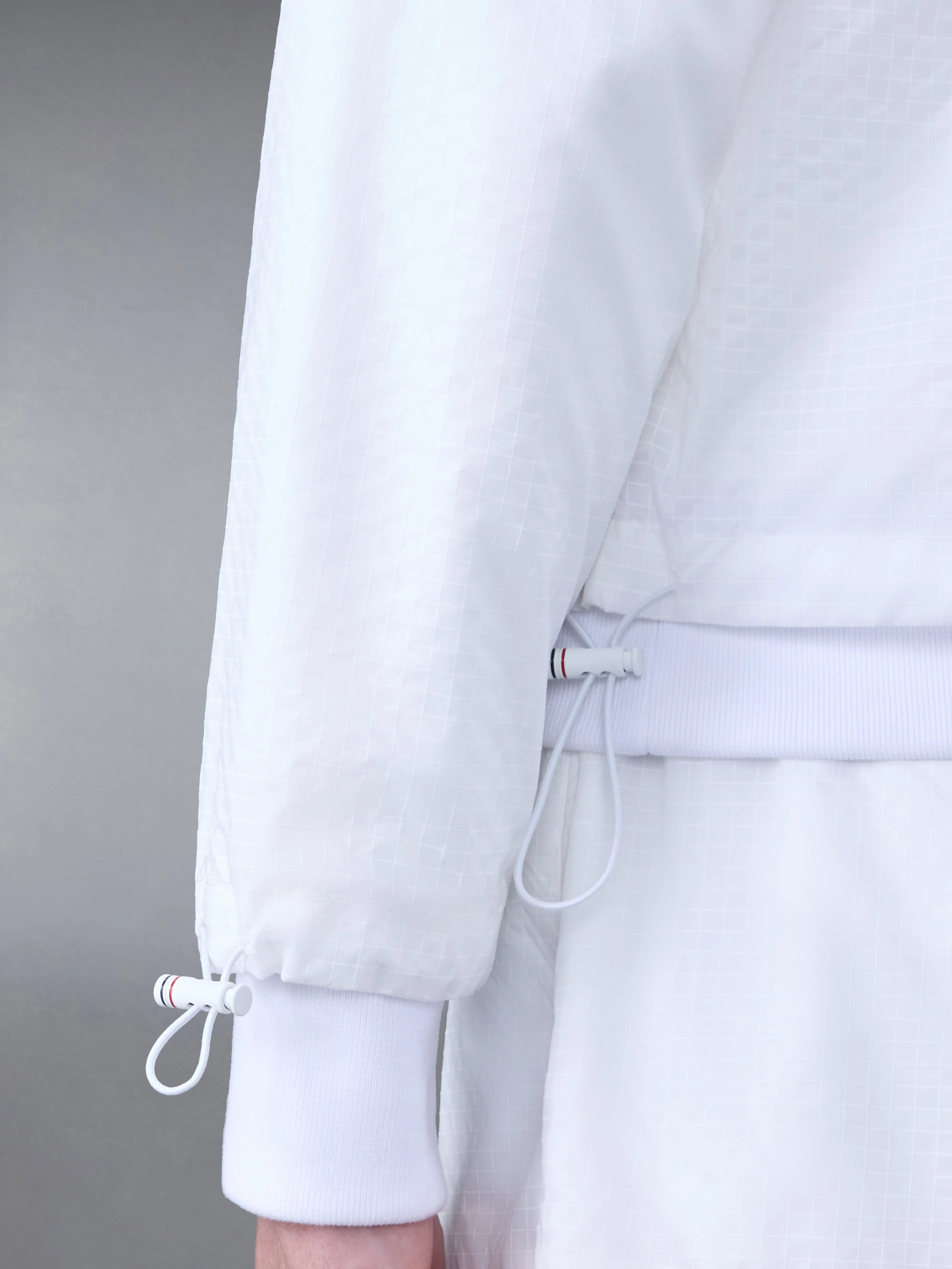 ULTRALIGHT RIPSTOP 4-BAR FUNNEL NECK JACKET sold by Thom Browne product image thumbnail 4