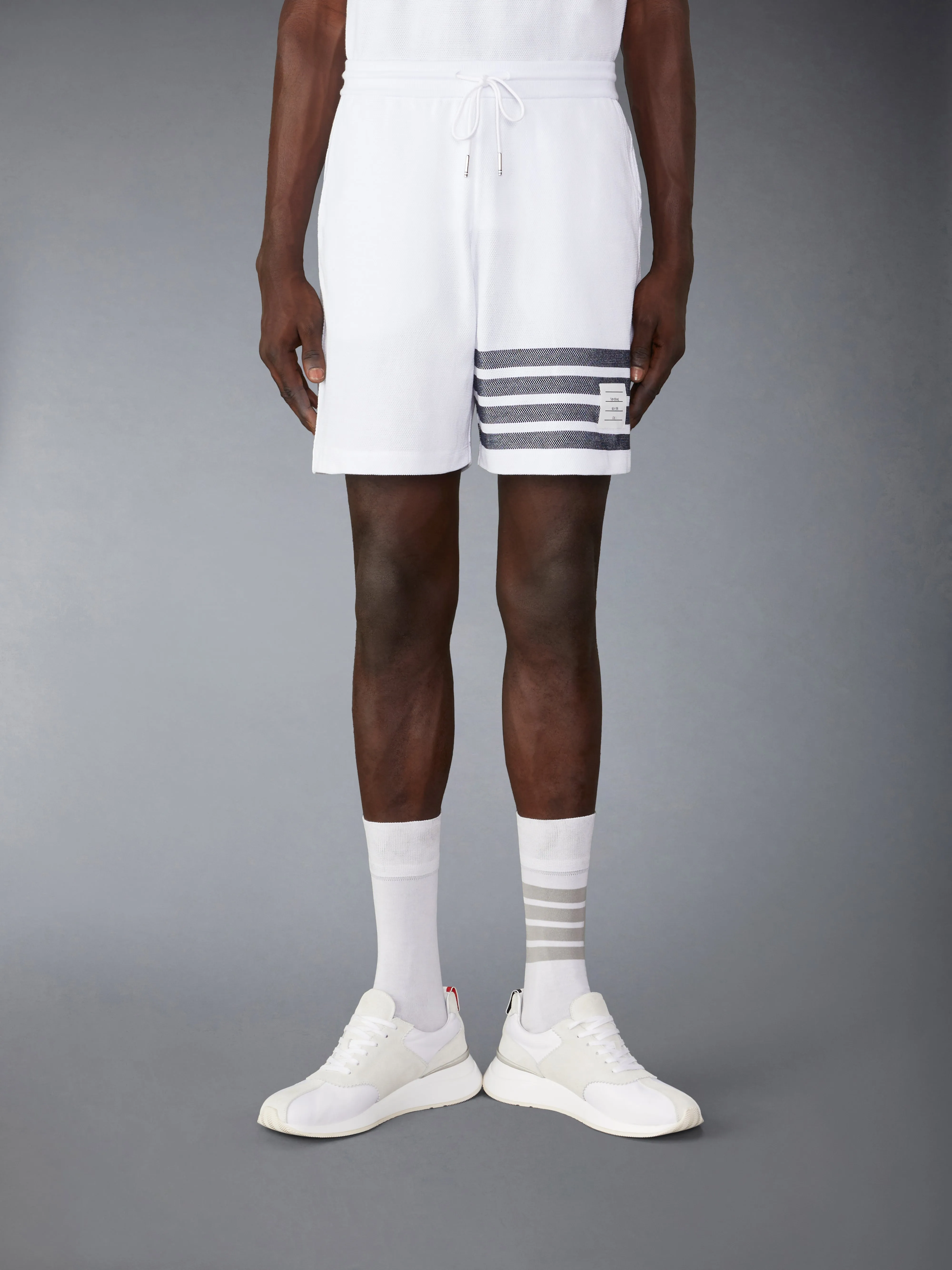COTTON PIQUE 4-BAR SHORTS sold by Thom Browne