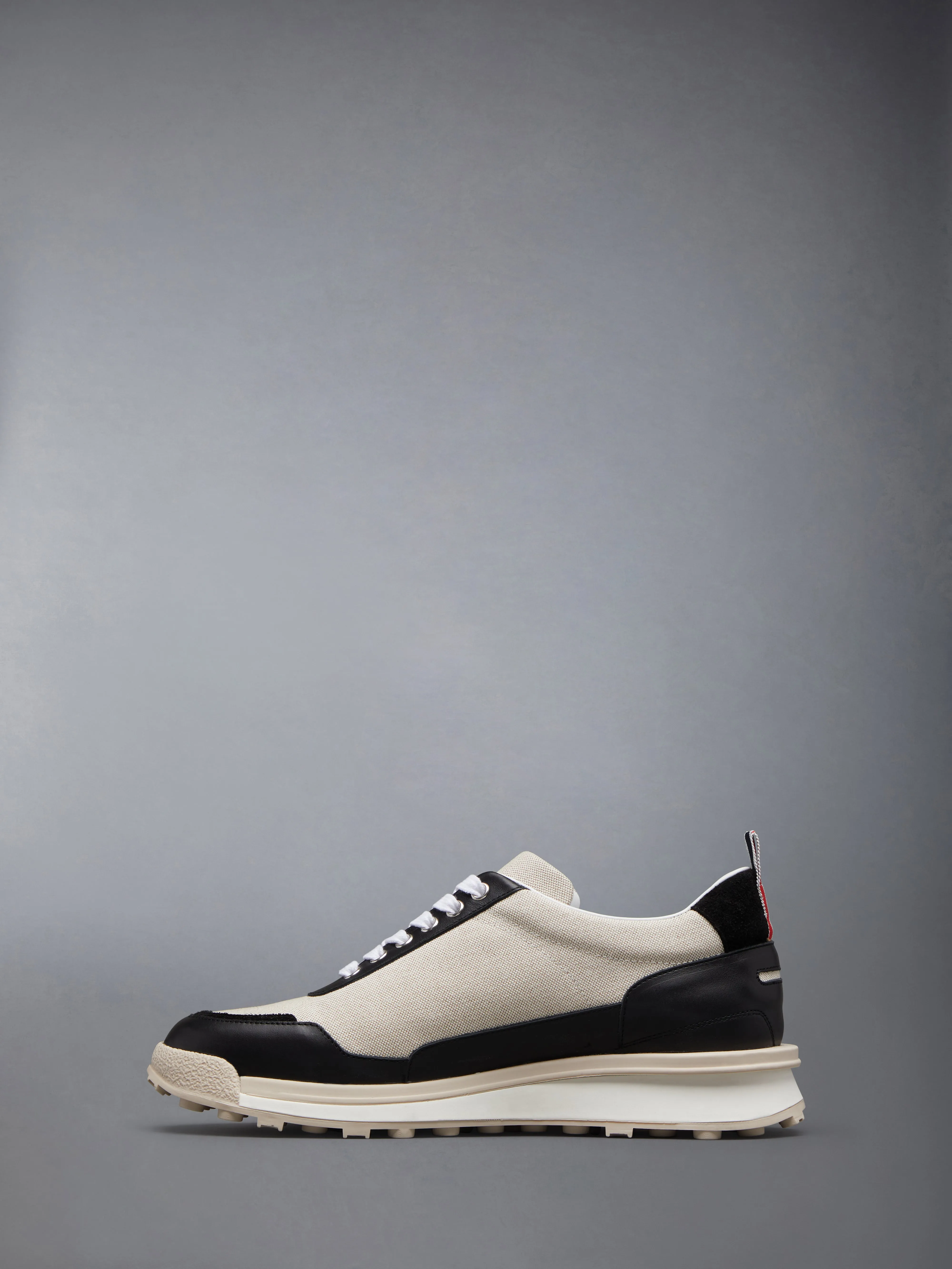 COTTON CANVAS ALUMNI TRAINER sold by Thom Browne product image thumbnail 3