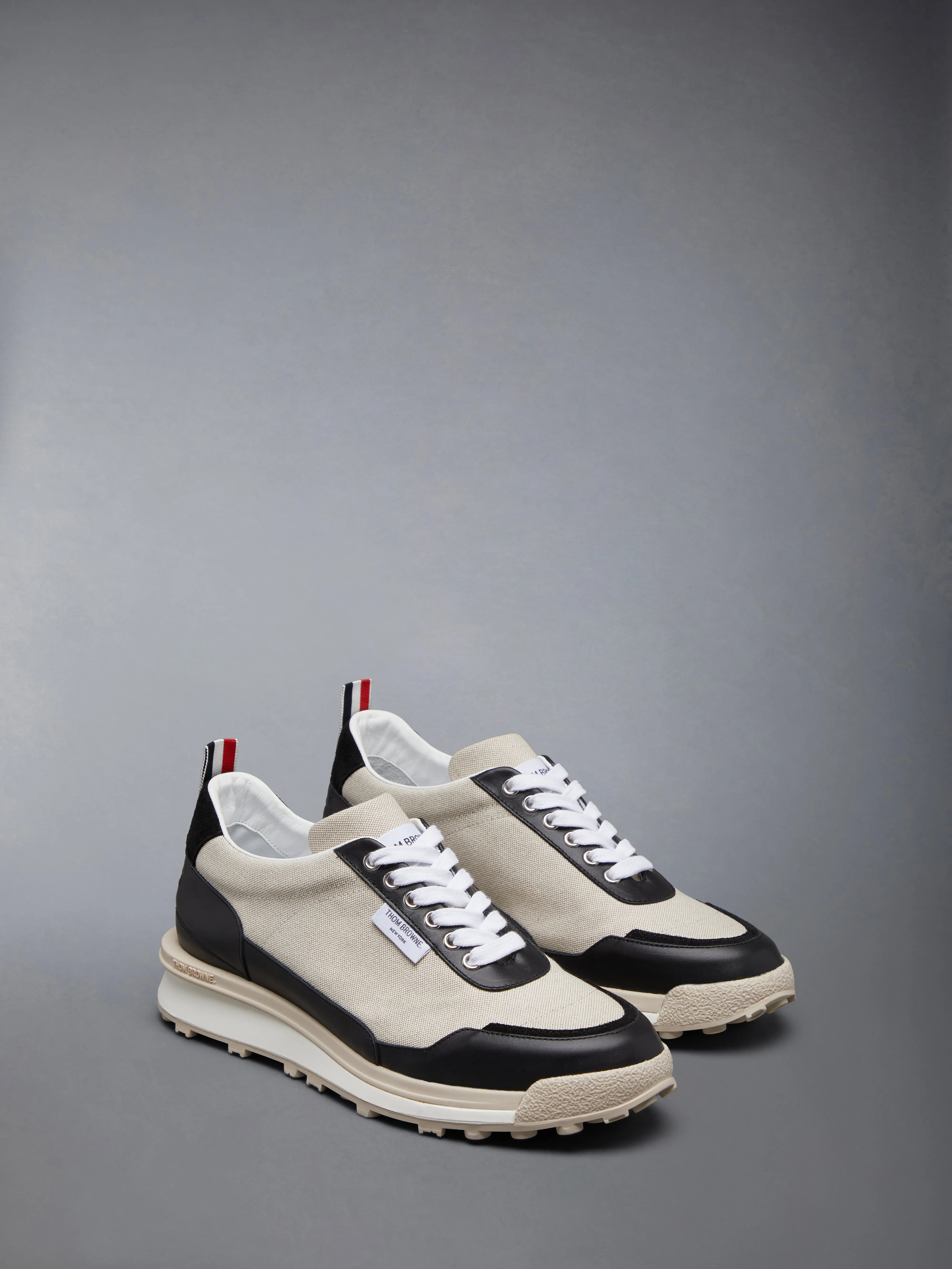 COTTON CANVAS ALUMNI TRAINER sold by Thom Browne product image thumbnail 2