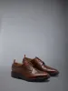 RUBBER SOLE CLASSIC LONGWING BROGUE sold by Thom Browne