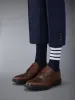 RUBBER SOLE CLASSIC LONGWING BROGUE sold by Thom Browne