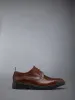 RUBBER SOLE CLASSIC LONGWING BROGUE sold by Thom Browne