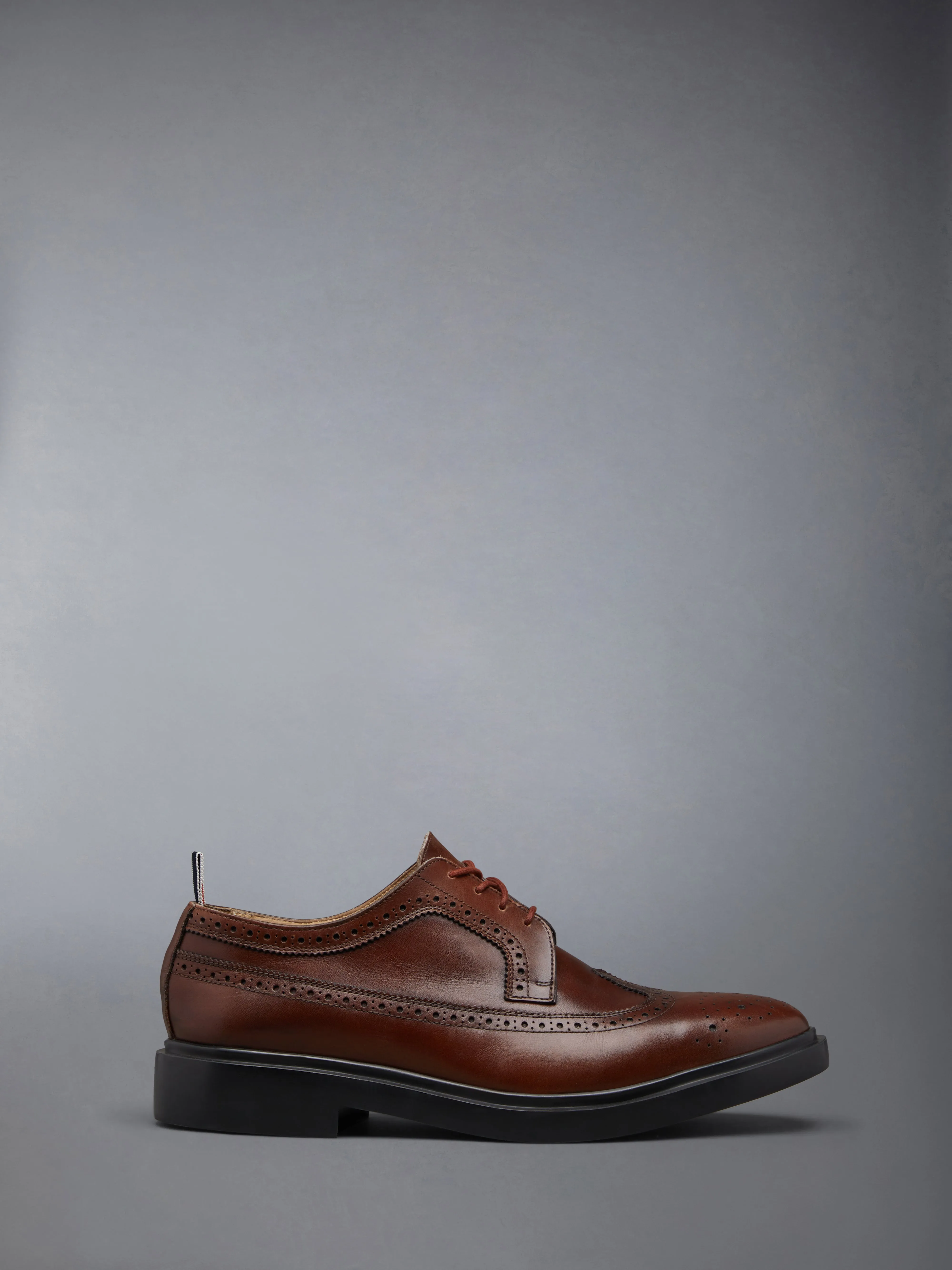 RUBBER SOLE CLASSIC LONGWING BROGUE sold by Thom Browne