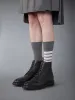 CLASSIC CALF COMMANDO SOLE APRON STITCH BOOTS sold by Thom Browne