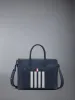 PEBBLE GRAIN 4-BAR BRIEFCASE sold by Thom Browne