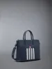 PEBBLE GRAIN 4-BAR BRIEFCASE sold by Thom Browne