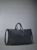 PEBBLE GRAIN DUFFLE sold by Thom Browne
