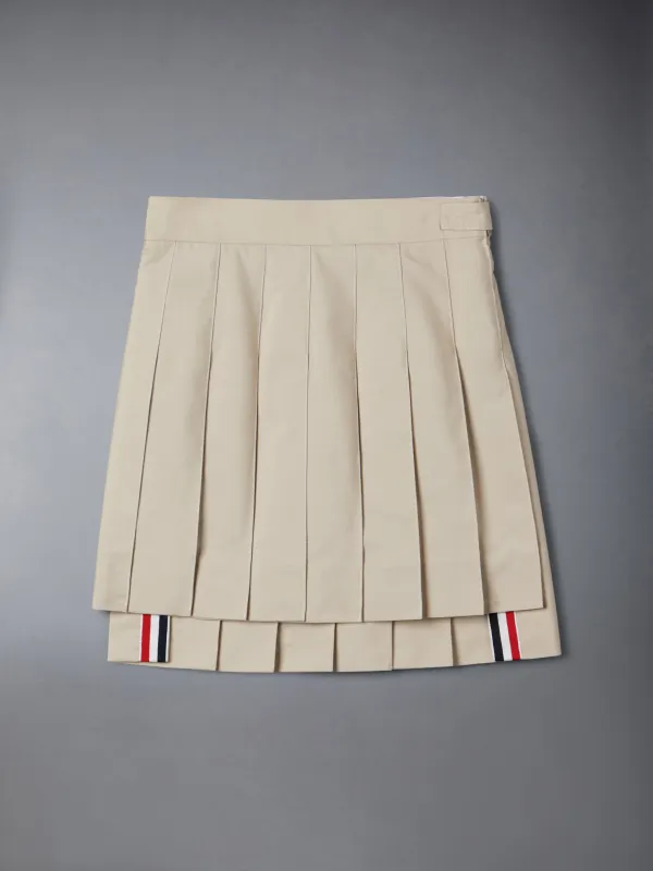 TYPEWRITER PLEATED MINI SKIRT sold by Thom Browne