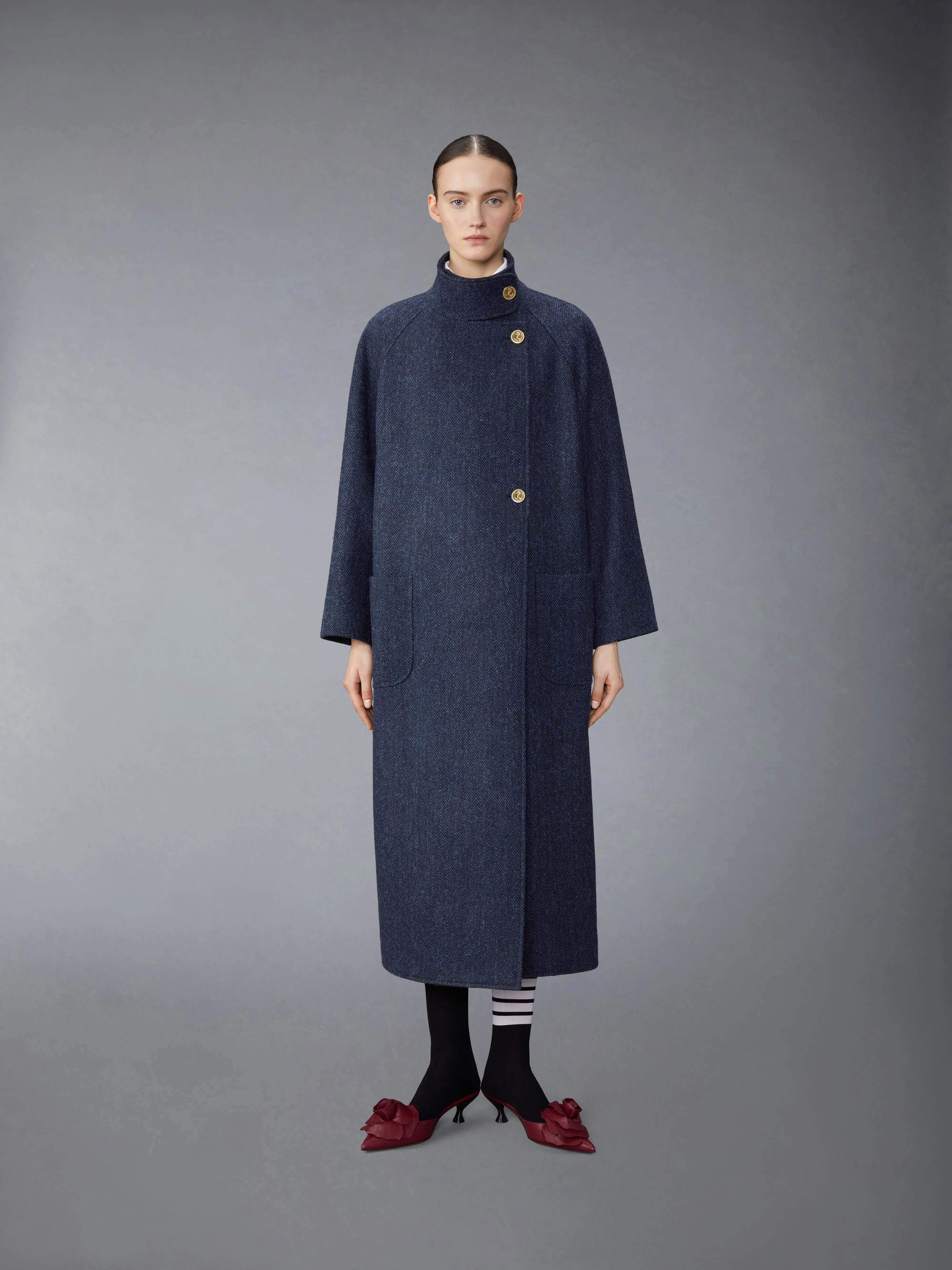 HERRINGBON HARRIS TWEED MIDI RAGLAN FUNNEL NECK COAT sold by Thom Browne