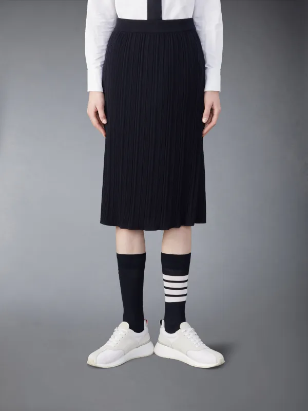 WOOL CREPE RIB STITCH MIDI PLISSE SKIRT sold by Thom Browne