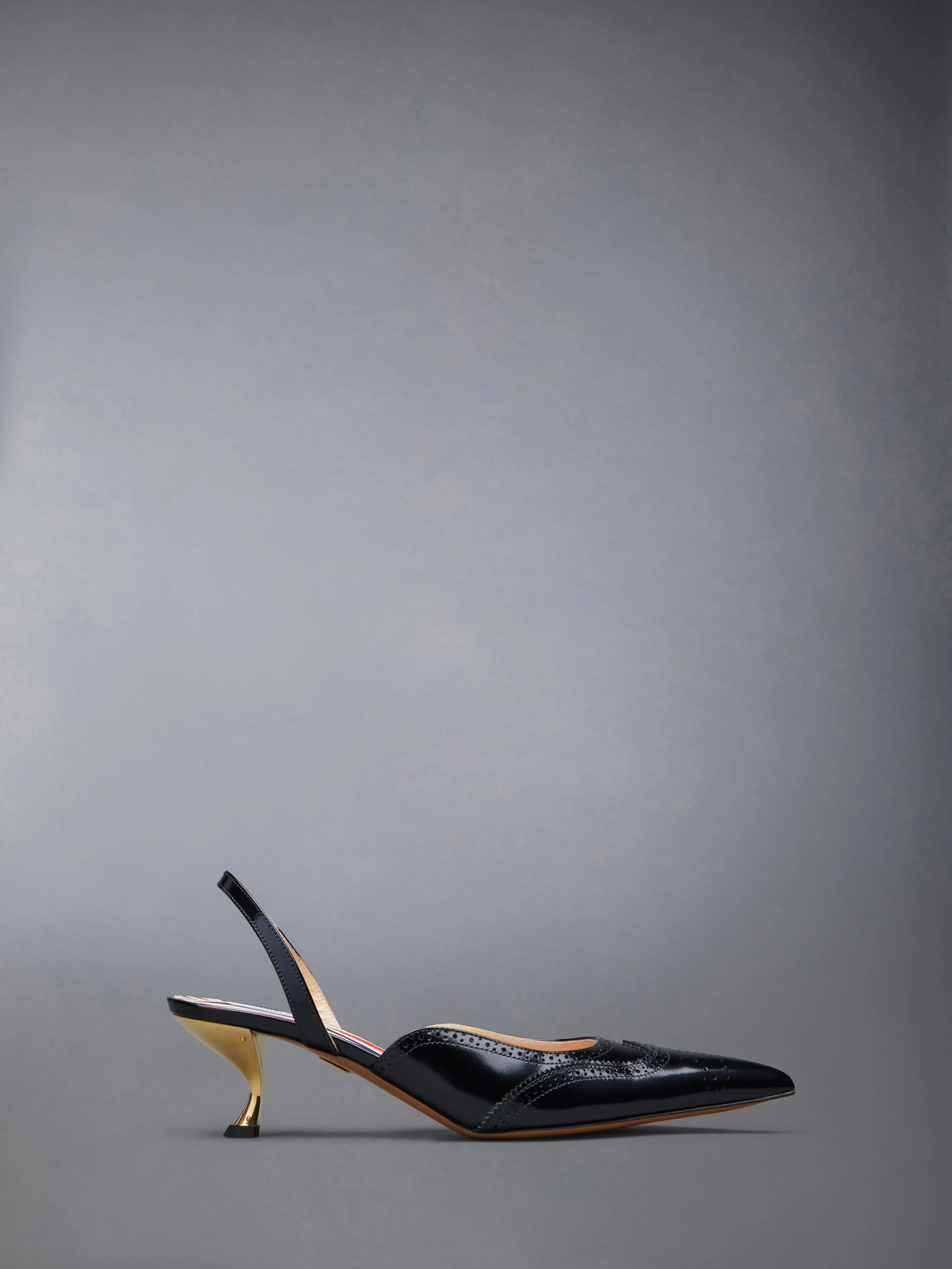SMOOTH CALF WINGTIP CURVED HEEL SLINGBACK sold by Thom Browne