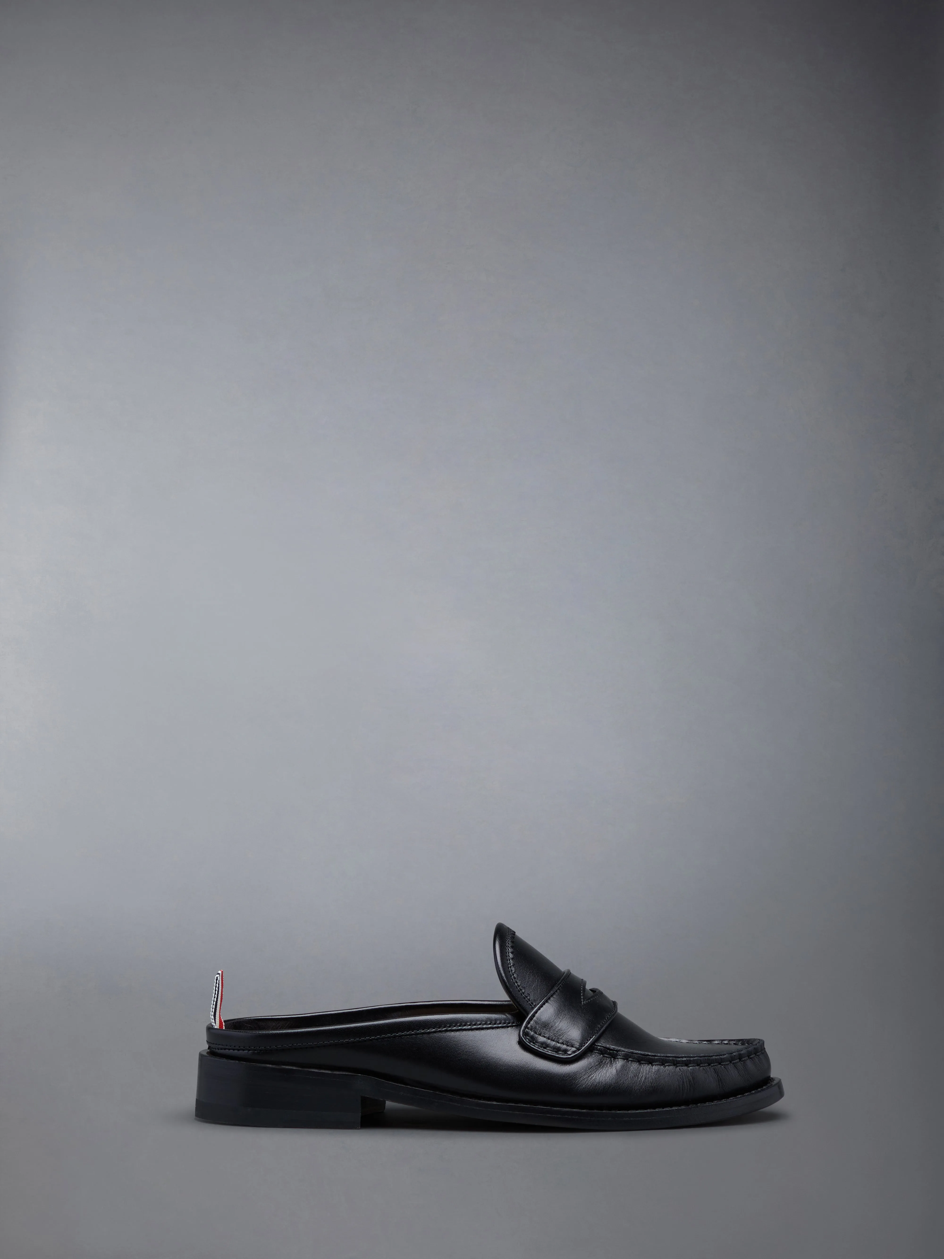 CALF FLEXIBLE LEATHER SOLE PENNY LOAFER MULE sold by Thom Browne