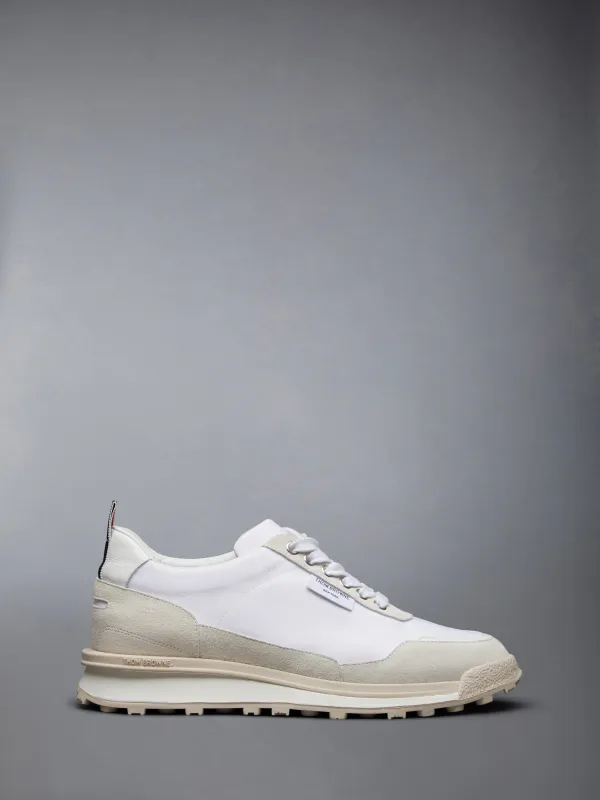 ECO NYLON ALUMNI TRAINER sold by Thom Browne