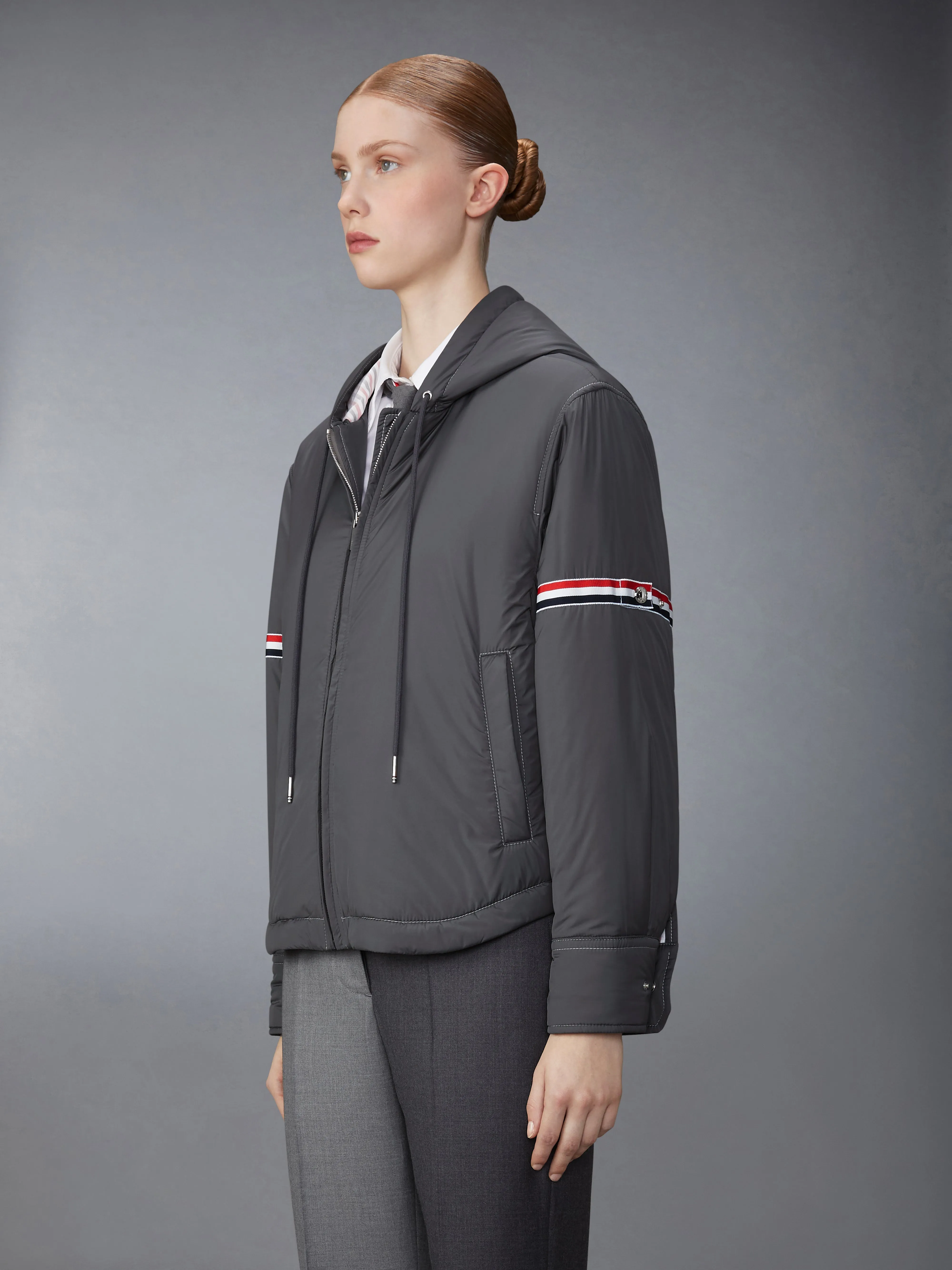 ULTRA LIGHT NYLON TECH DOWN ARMBAND JACKET sold by Thom Browne