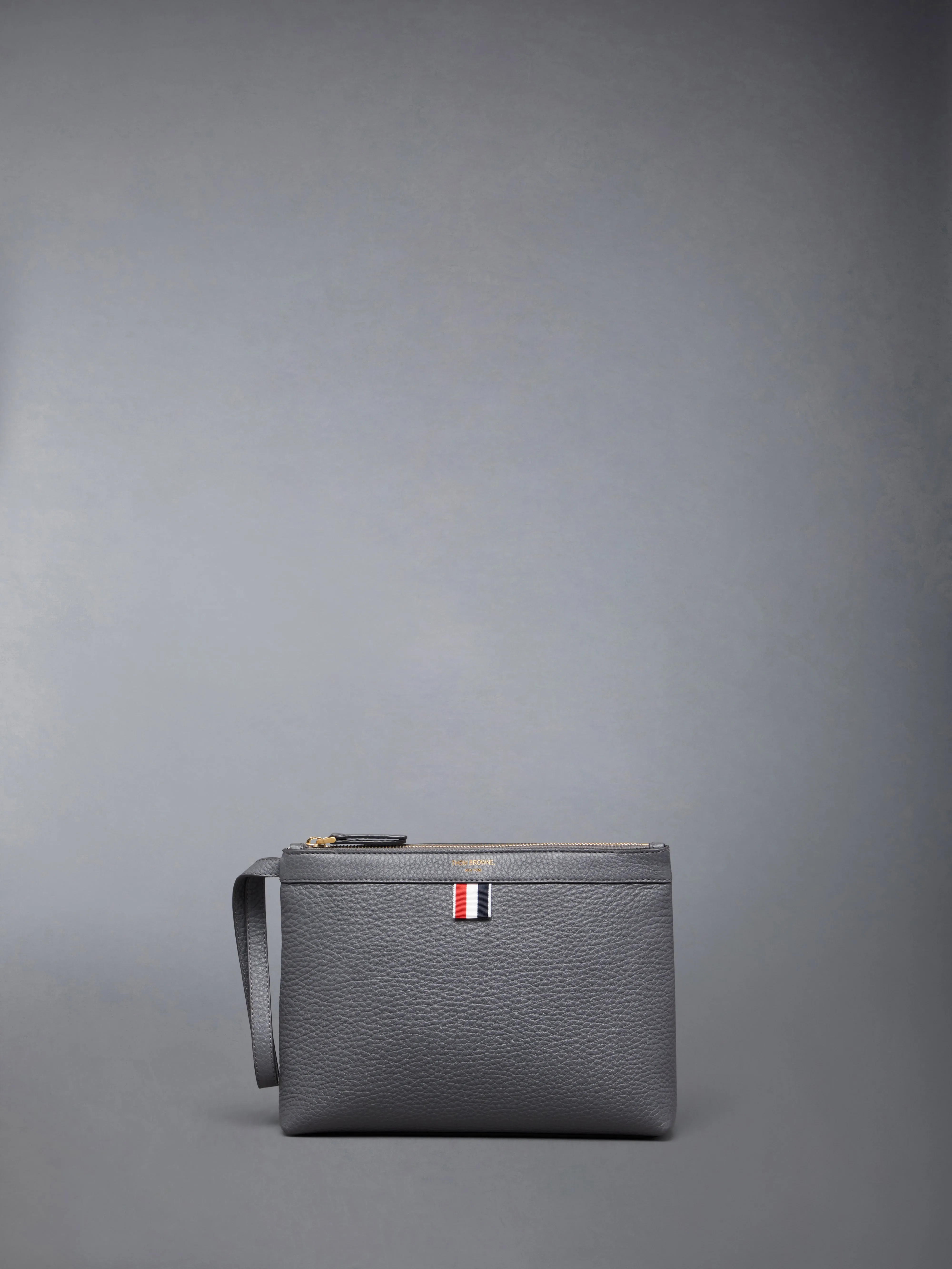 SOFT PEBBLE GRAIN TOILETRY CASE sold by Thom Browne