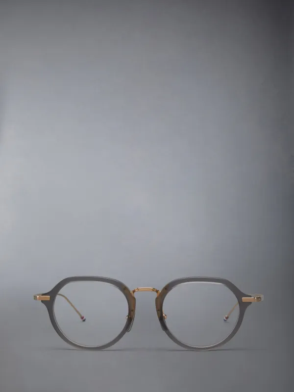 ACETATE AND TITANIUM ROUND EYEGLASSES sold by Thom Browne