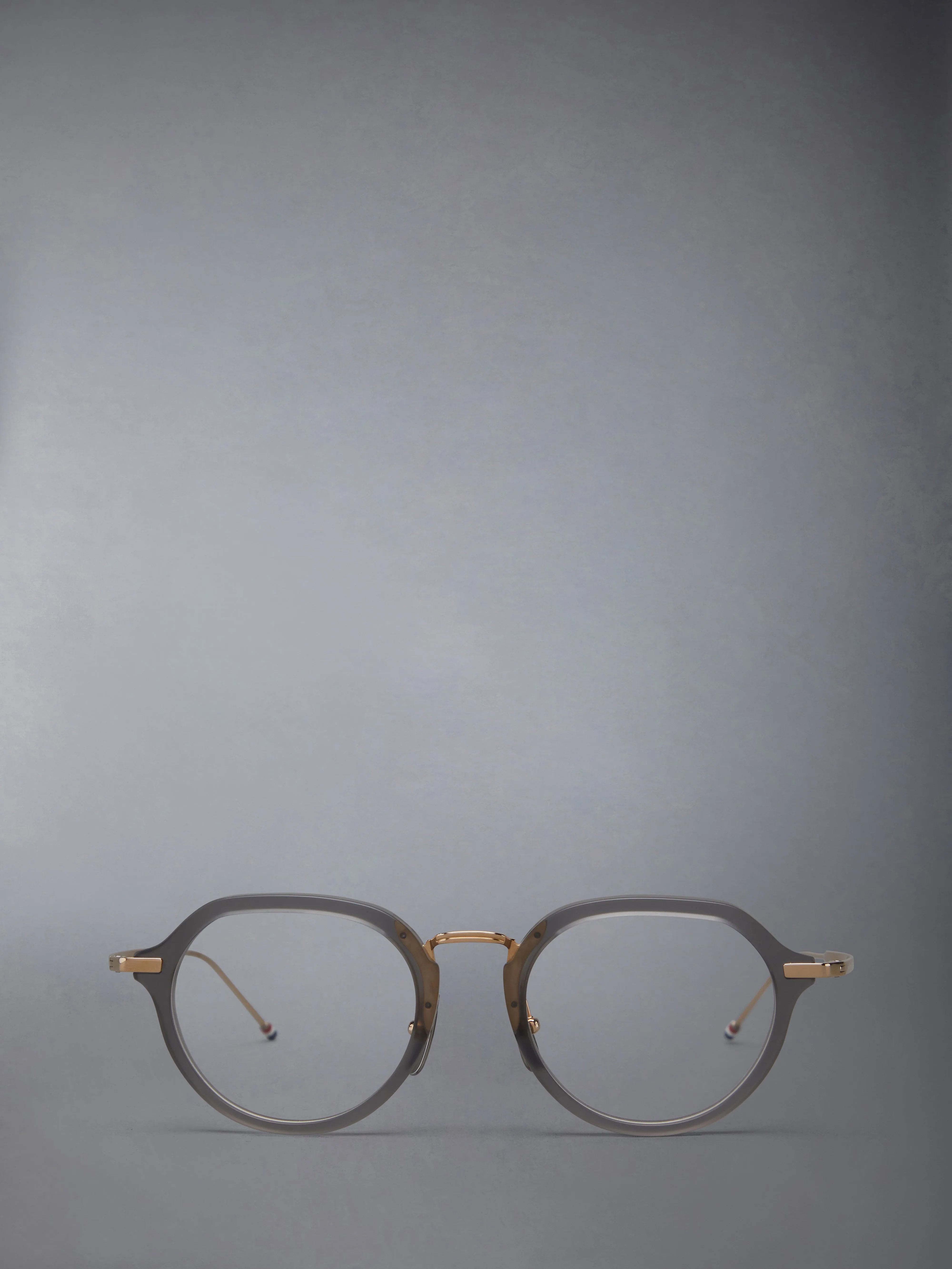 ACETATE AND TITANIUM ROUND EYEGLASSES sold by Thom Browne